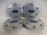FORD FIESTA 2002-2008 SET OF ALLOY CENTRE CAPS 2002,2003,2004,2005,2006,2007,2008FORD FIESTA 2002-2008 SET OF 14 INCH ALLOY WHEEL CENTRE CAPS - 97BG-1000-EC 97BG-1000-EC     Used